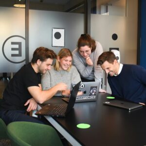 A group of people sitting around a table