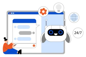 A man sitting in front of a computer with a robot on it